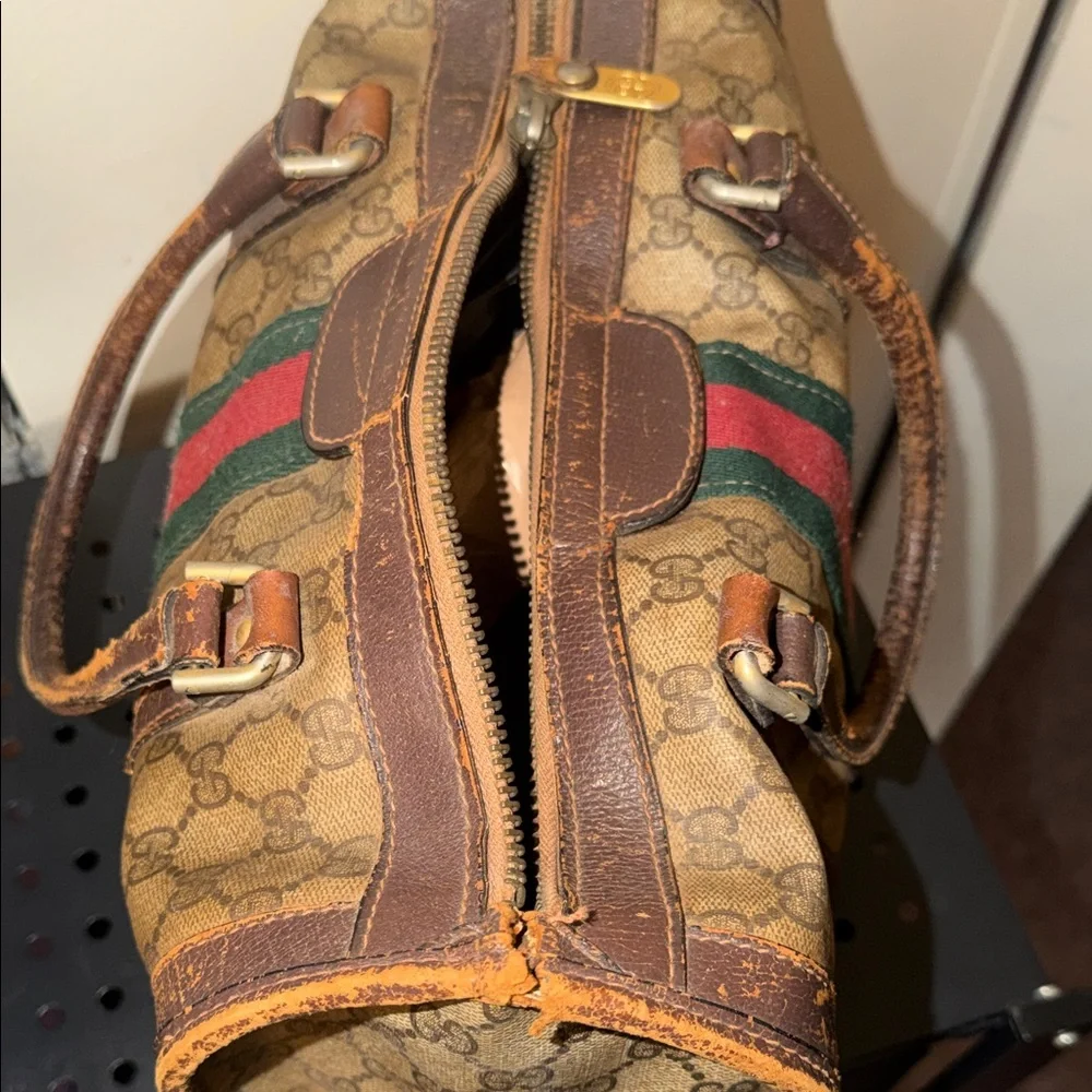 Gucci Brown and Green Signature Duffel Bag with authentic paperwork .